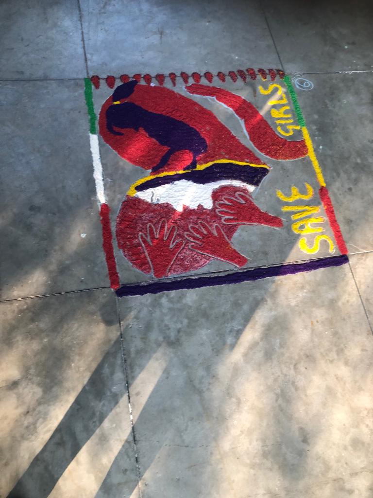 Painting Rangoli and other compititions at Tilak Hall